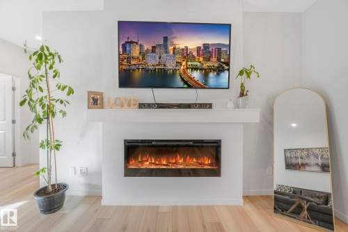 7182 177A Avenue, Edmonton, AB - Indoor Photo Showing Living Room With Fireplace