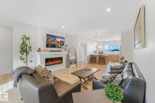 7182 177A Avenue, Edmonton, AB - Indoor Photo Showing Living Room With Fireplace