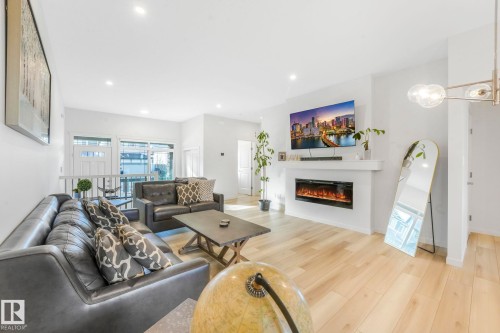 7182 177A Avenue, Edmonton, AB - Indoor Photo Showing Living Room With Fireplace