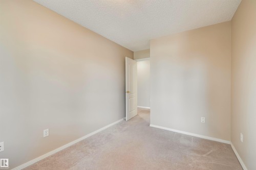 Spare room - 209 17150 94A Avenue, Edmonton, AB - Indoor Photo Showing Other Room