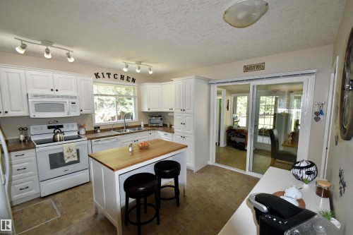 223 11502 Twp Rd 604, Rural St. Paul County, AB - Indoor Photo Showing Kitchen With Double Sink