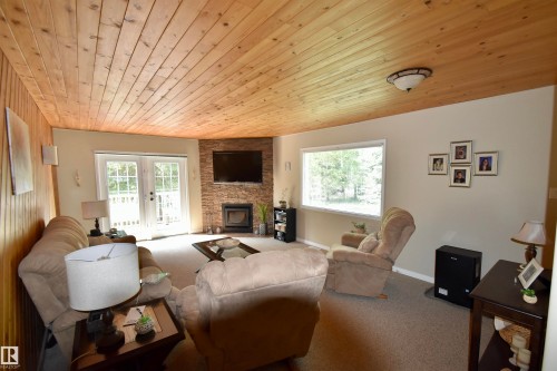 223 11502 Twp Rd 604, Rural St. Paul County, AB - Indoor Photo Showing Living Room With Fireplace