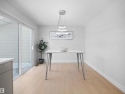 Office featuring light wood-style floors and baseboards - 