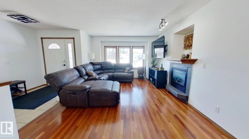 5322 55 Avenue, Bashaw, AB - Indoor Photo Showing Living Room With Fireplace