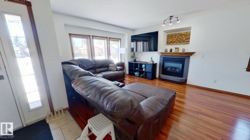 5322 55 Avenue, Bashaw, AB - Indoor Photo Showing Living Room With Fireplace