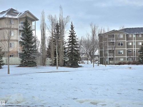 Walking trails behind the building that lead to parks and the Tri Liesure Centre. - 204 240 Spruce Ridge Road, Spruce Grove, AB - Outdoor