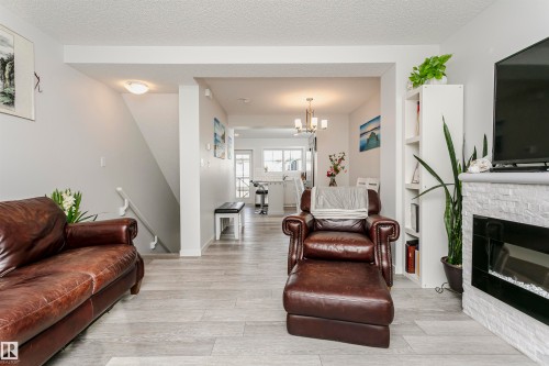 19627 28 Avenue, Edmonton, AB - Indoor Photo Showing Living Room With Fireplace