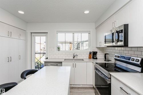 19627 28 Avenue, Edmonton, AB - Indoor Photo Showing Kitchen With Stainless Steel Kitchen With Double Sink With Upgraded Kitchen
