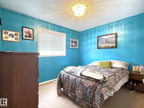735 Kananaskis Drive, Devon, AB - Indoor Photo Showing Bedroom