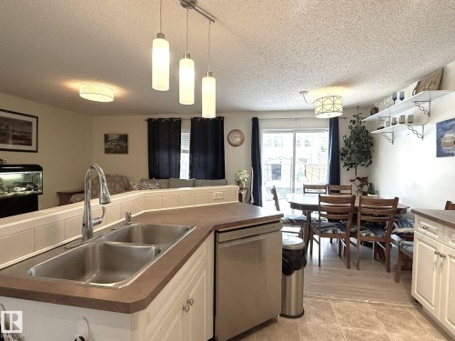 735 Kananaskis Drive, Devon, AB - Indoor Photo Showing Kitchen With Double Sink