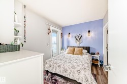 Bedroom with wood finished floors - 