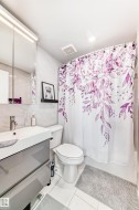 Bathroom featuring vanity and shower / bath combo - 