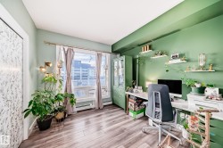 Home office with light wood-style floors - 