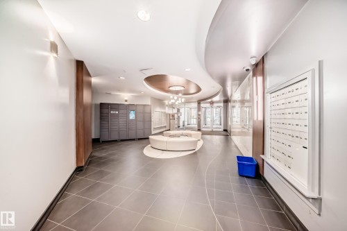 Community lobby with recessed lighting - 2004 10136 104 Street, Edmonton, AB - Indoor Photo Showing Other Room