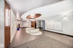 Lobby featuring recessed lighting and a tray ceiling - 