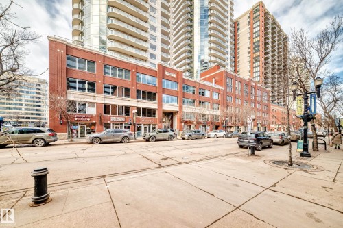 View of building exterior featuring a city view - 2004 10136 104 Street, Edmonton, AB - Outdoor With Facade