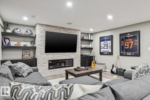 3673 Atkinson Loop, Edmonton, AB - Indoor Photo Showing Living Room With Fireplace