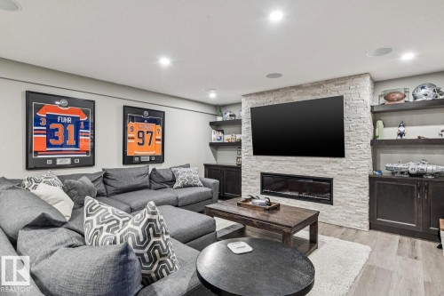 3673 Atkinson Loop, Edmonton, AB - Indoor Photo Showing Living Room With Fireplace