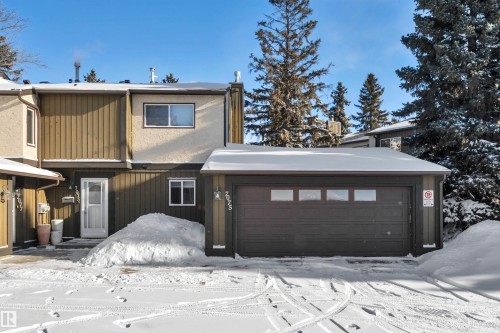 View of front of property with a garage - 7075 32 Avenue, Edmonton, AB - Outdoor