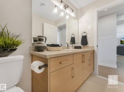 Bathroom with vanity and toilet - 