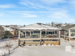 Snow covered property featuring a deck - 
