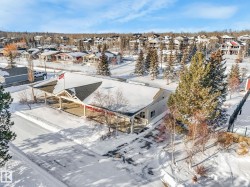 Snowy aerial view with a residential view - 