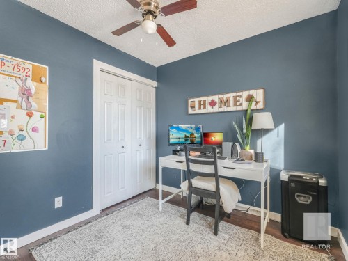 Office area with ceiling fan, wood finished floors, and a textured ceiling - 4504 48 Avenue, Onoway, AB - Indoor Photo Showing Office