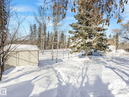 View of yard layered in snow - 4504 48 Avenue, Onoway, AB - Outdoor With View