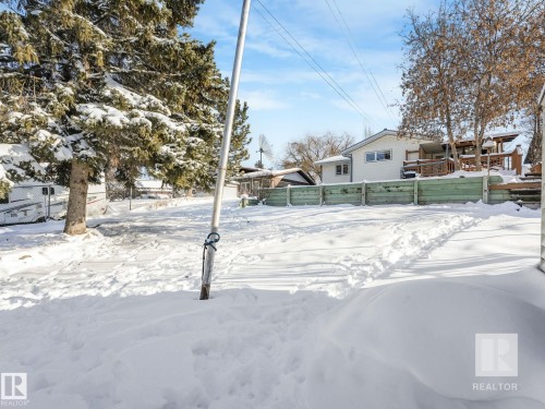 View of yard layered in snow - 4504 48 Avenue, Onoway, AB - Outdoor