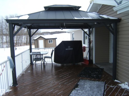 Deck with a gazebo and outdoor dining area - 125076 Twp Rd 540, Rural Two Hills County, AB - Outdoor With Deck Patio Veranda With Exterior