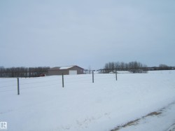 View of yard covered in snow - 