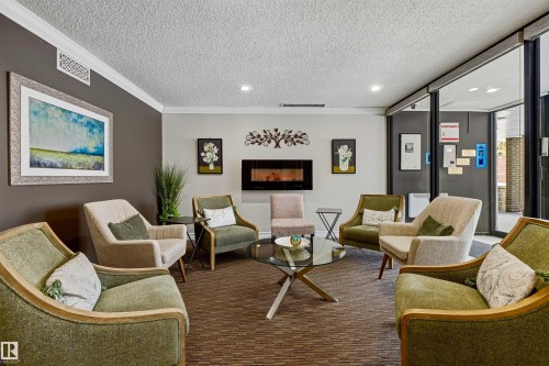 409 14810 51 Avenue, Edmonton, AB - Indoor Photo Showing Living Room