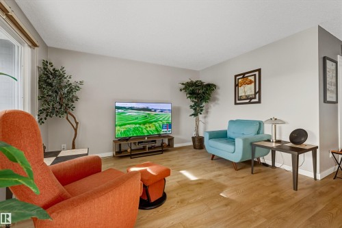 409 14810 51 Avenue, Edmonton, AB - Indoor Photo Showing Living Room