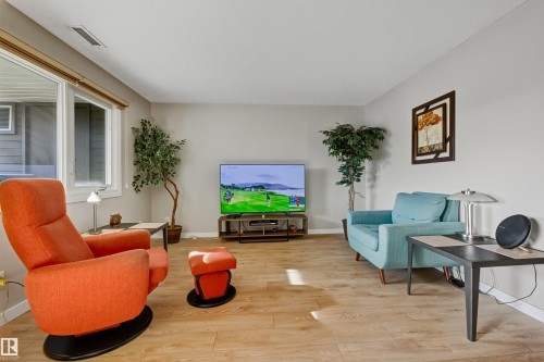 409 14810 51 Avenue, Edmonton, AB - Indoor Photo Showing Living Room