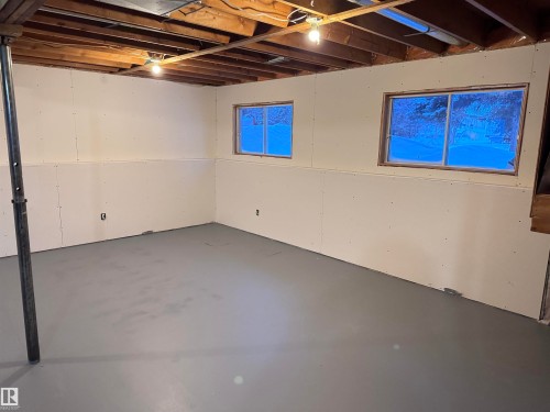 View of basement - 4919 49 Avenue, Vimy, AB - Indoor Photo Showing Basement