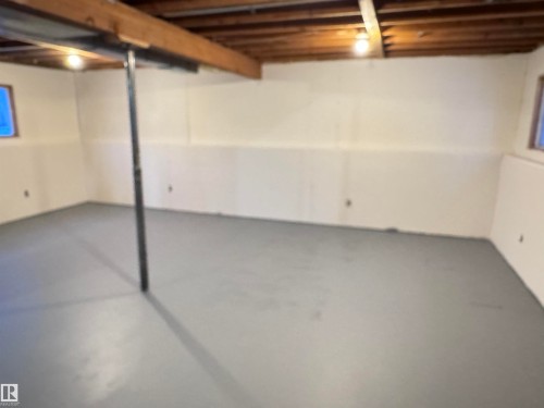 View of unfinished below grade area - 4919 49 Avenue, Vimy, AB - Indoor Photo Showing Basement