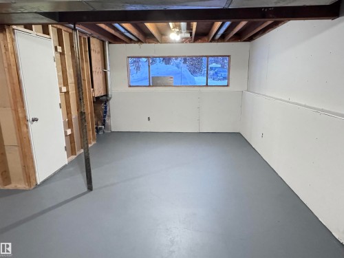 View of below grade area - 4919 49 Avenue, Vimy, AB - Indoor Photo Showing Basement