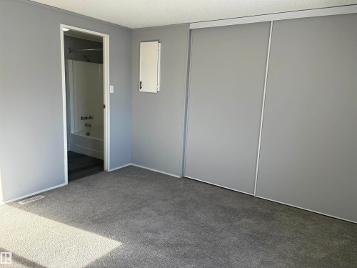 Full bathroom featuring vanity, tub / shower combination, and dark wood-style floors - 8 Evergreen Park Drive, Edmonton, AB - Indoor Photo Showing Bathroom