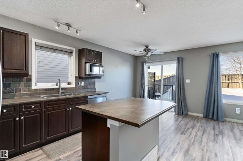 168 Keystone Crescent, Leduc, AB - Indoor Photo Showing Kitchen With Double Sink