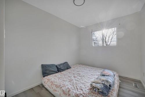 8216-8222 120 Avenue, Edmonton, AB - Indoor Photo Showing Bedroom