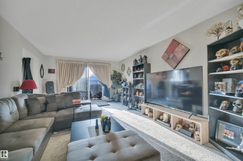 8216-8222 120 Avenue, Edmonton, AB - Indoor Photo Showing Living Room