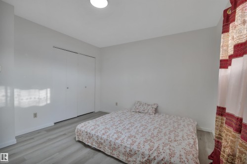 8216-8222 120 Avenue, Edmonton, AB - Indoor Photo Showing Bedroom