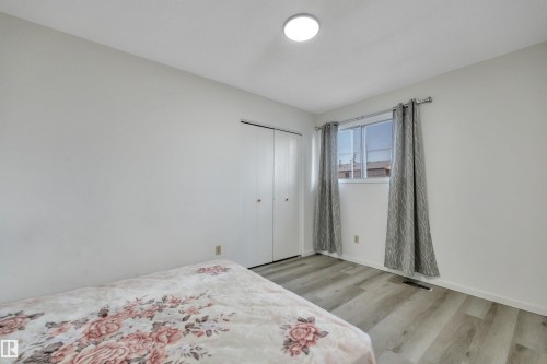 8216-8222 120 Avenue, Edmonton, AB - Indoor Photo Showing Bedroom