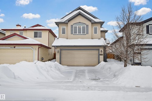 Traditional-style home with a garage - 4020 157A Avenue, Edmonton, AB - Outdoor With Facade