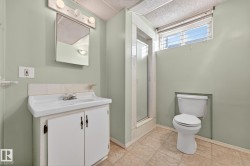 Full bathroom with a shower stall and vanity - 