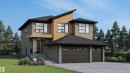 Contemporary home featuring stone siding, roof with shingles, concrete driveway, and a front yard - 6871 Knox Loop Sw, Edmonton, AB  - Outdoor 