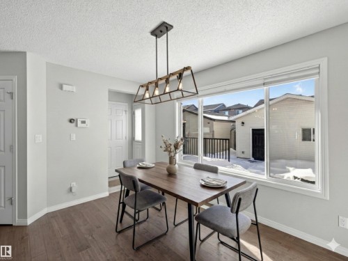 Digitally staged for illustrative purposes - 1267 Chappelle Boulevard, Edmonton, AB - Indoor Photo Showing Dining Room