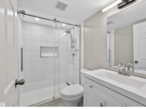 Full bathroom featuring vanity and a stall shower - 1267 Chappelle Boulevard, Edmonton, AB - Indoor Photo Showing Bathroom