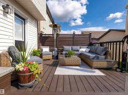 Wooden terrace with an outdoor living space - 