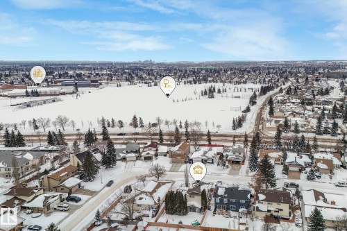 Snowy aerial view featuring a residential view - 15909 112 B Street Nw, Edmonton, AB - Outdoor With View